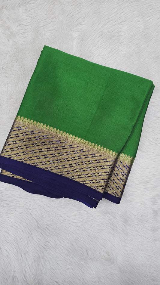 Mysore crepe silk saree with KSIC Finish in leaf green with ink blue with big border