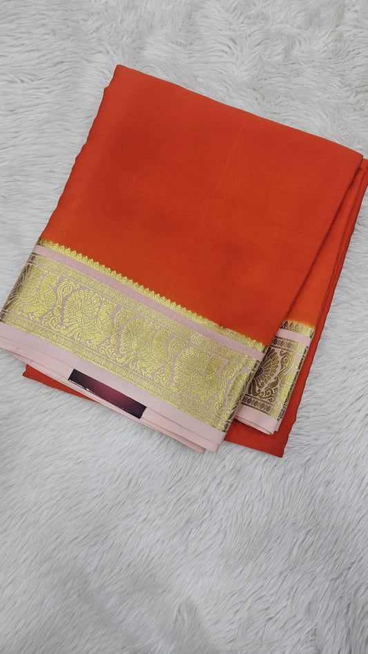 Mysore crepe silk saress in KSIC Finish in orange with peach with peacock border