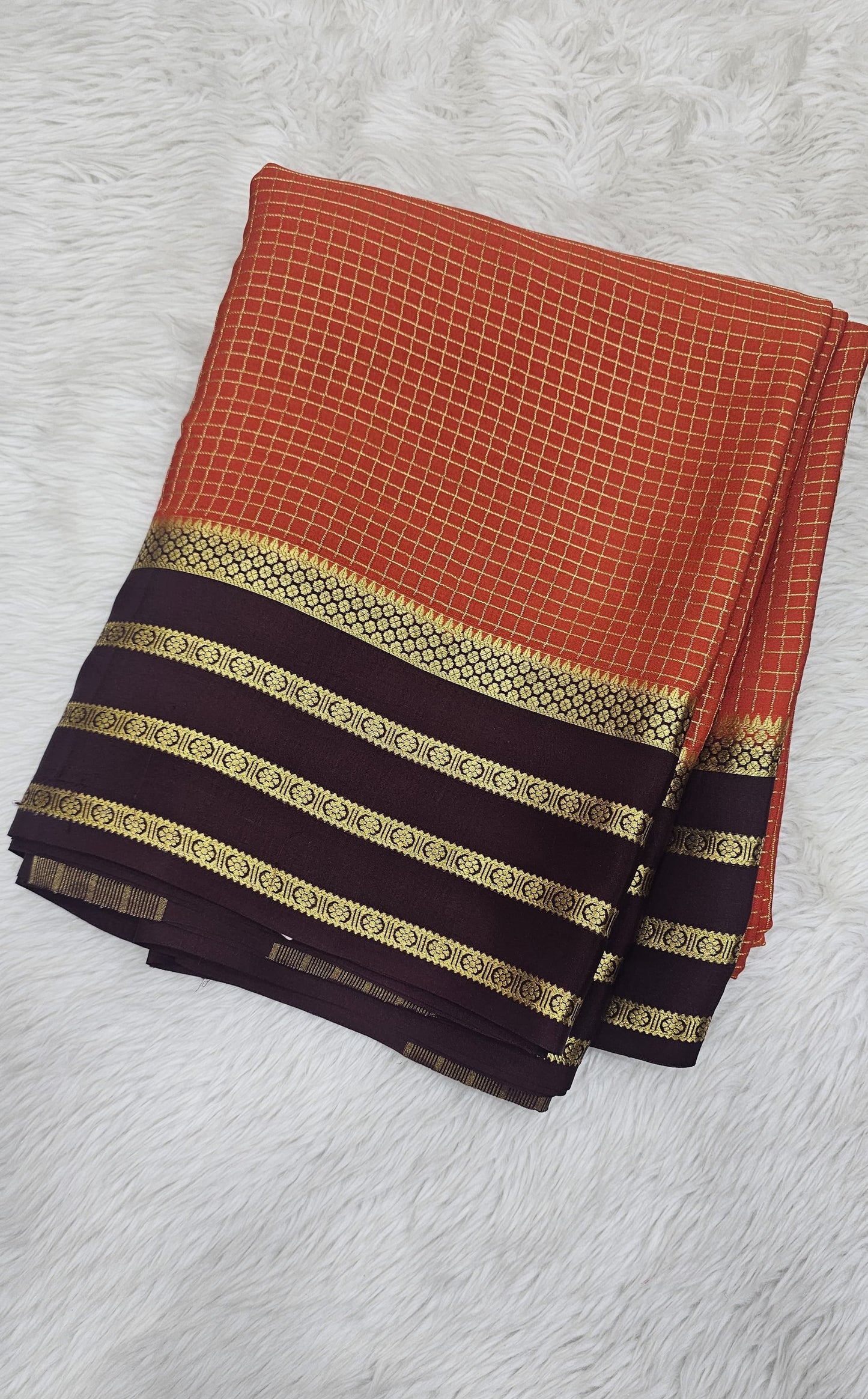 Mysore crepe silk sarees in KSIC finish in orange with brown checks pattern