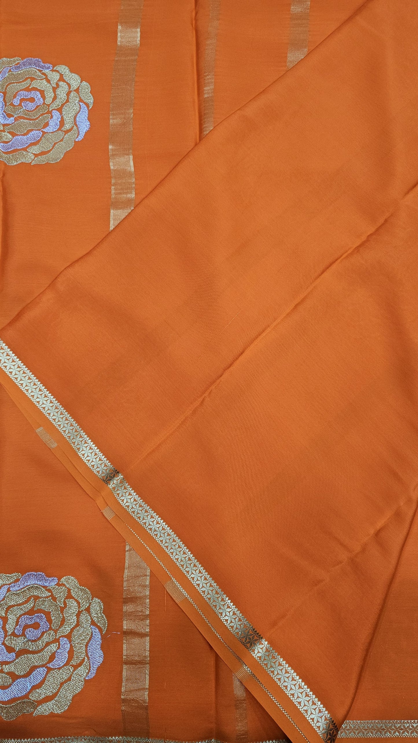 Mysore crepe silk in KSIC Finish in orange self rose butta saree