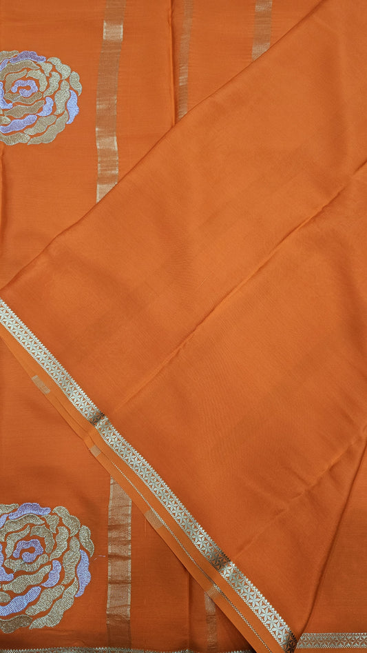 Mysore crepe silk in KSIC Finish in orange self rose butta saree