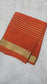 Mysore crepe silk sarees in KSIC Finish in orange self color lines pattern