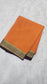 Mysore crepe silk in KSIC Finish in rust orange with brown small border