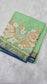 Mysore crepe silk saree in KSIC Finish in pista green with rama blue 1 sides cutwork