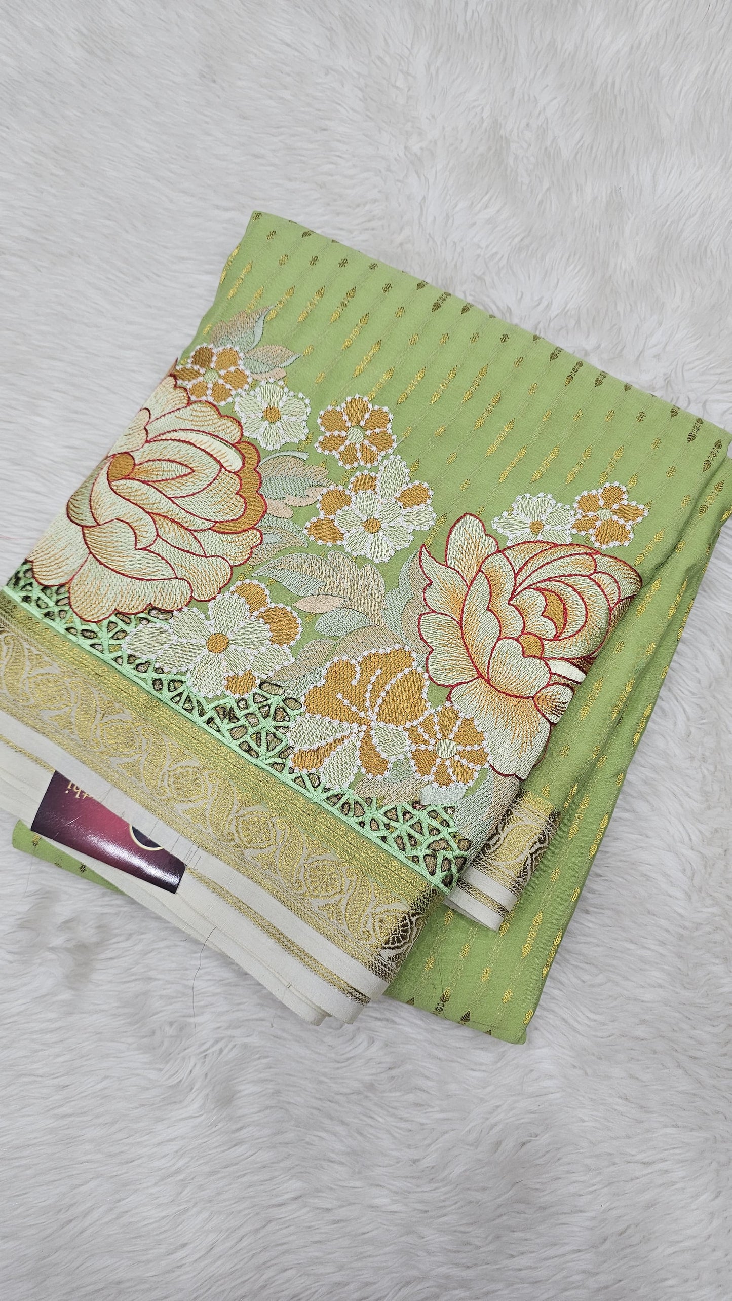 Mysore crepe silk saree in KSIC Finish in pista green with crem 1side cutwork saree