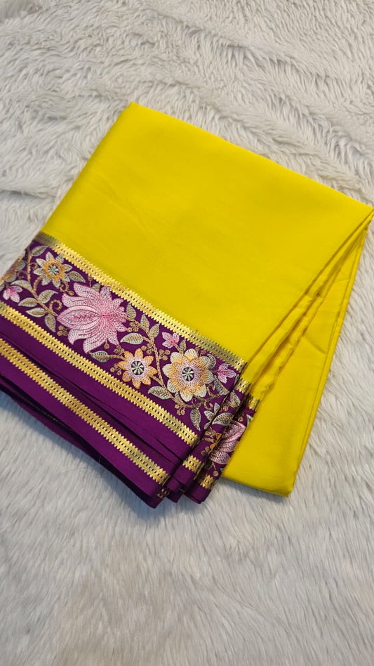 Mysore crepe silk saree in KSIC Finish in lemon yellow with purple  2side embroidery