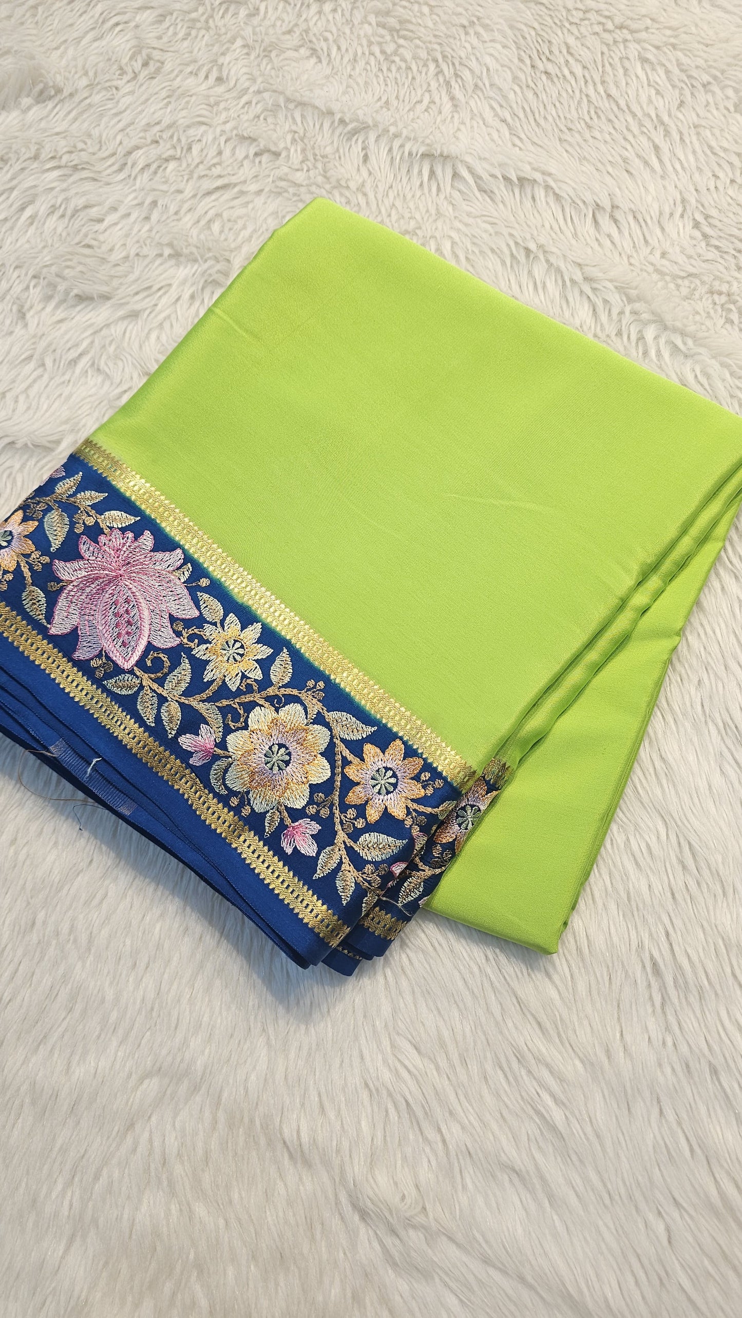 Mysore crepe silk saree in KSIC Finish in paroot green with peacock blue 2side embroidery