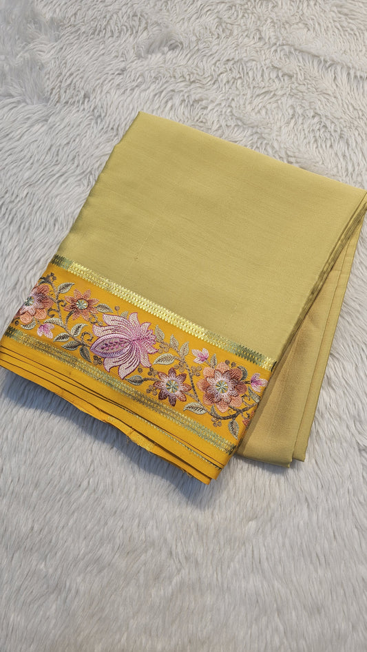 Mysore crepe silk saree in KSIC Finish in beige with mango yellow 2sides embroiedry