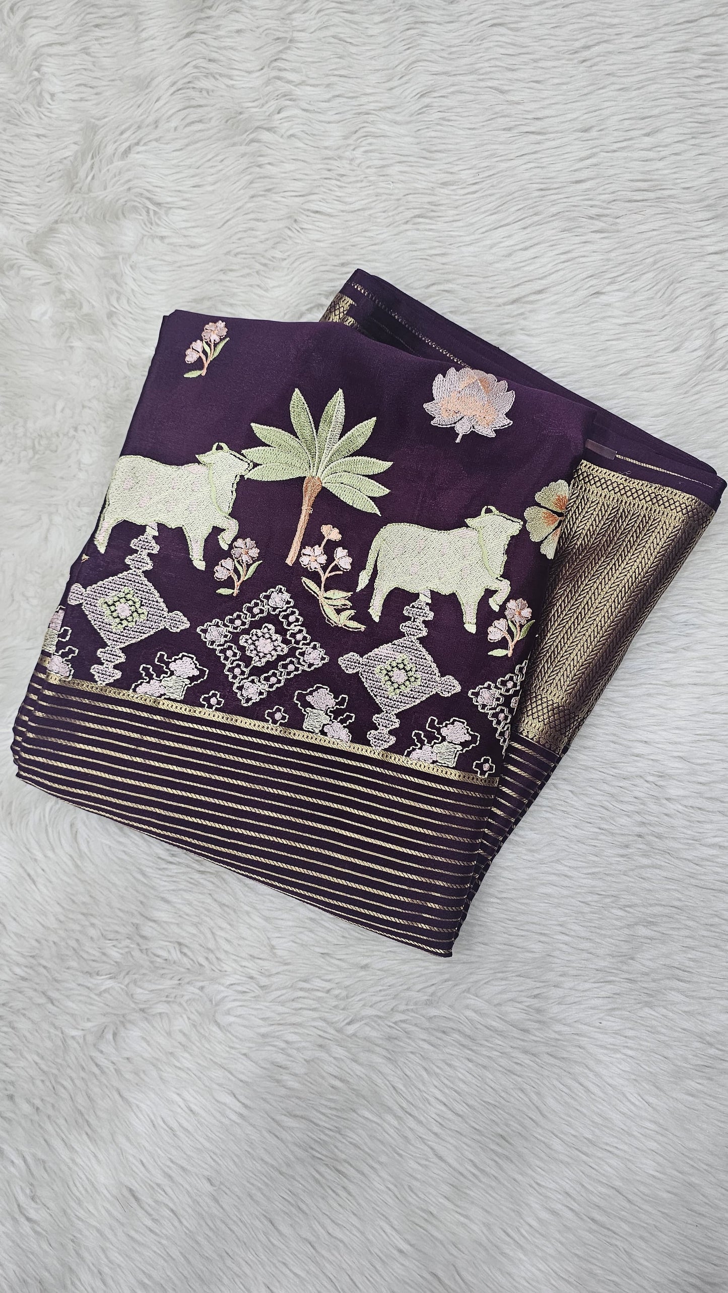 Mysore crepe silk saree in KSIC Finish in wine self middle pichwai embroidery pattern