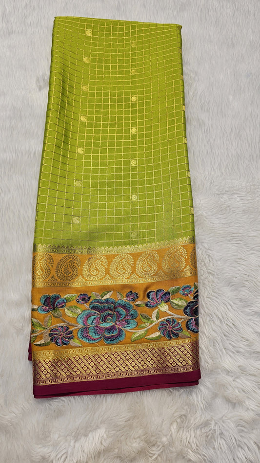 Mysore crepe silk saree with KSIC Finish in  green with orange 3 d checks pattern with embroidery