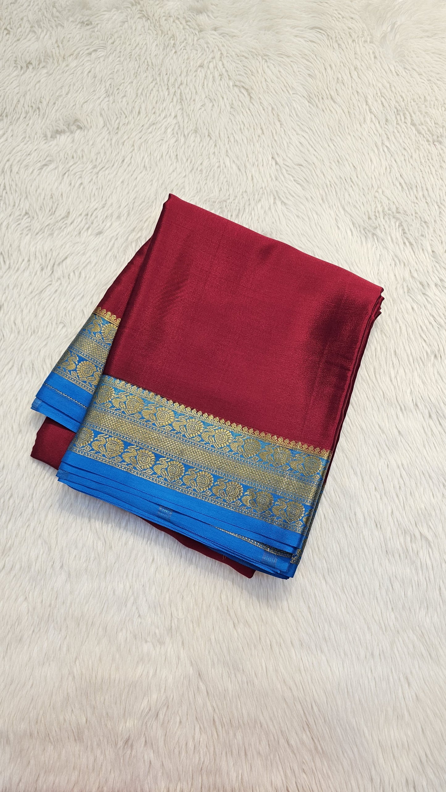Mysore crepe silk saree with KSIC Finish in chilly red with ocean blue in peacock border