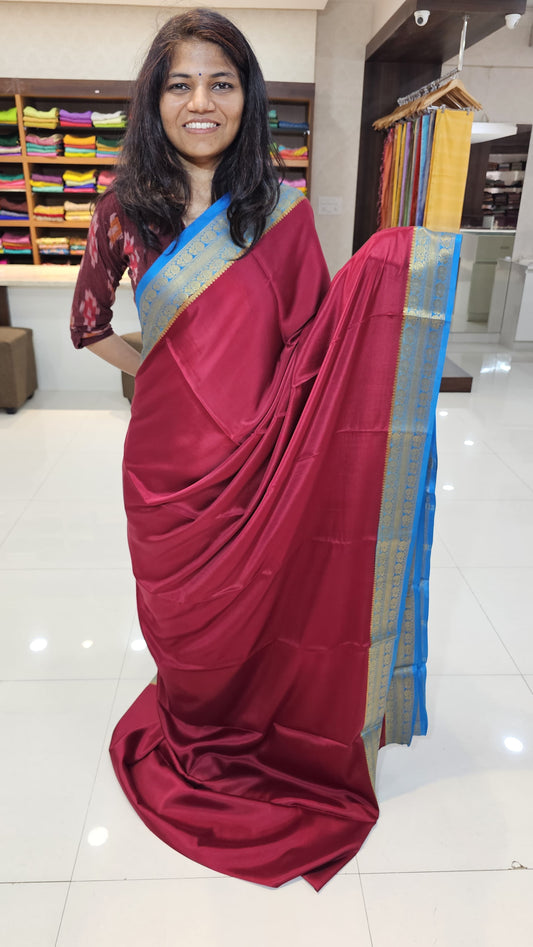 Mysore crepe silk saree with KSIC Finish in chilly red with ocean blue in peacock border