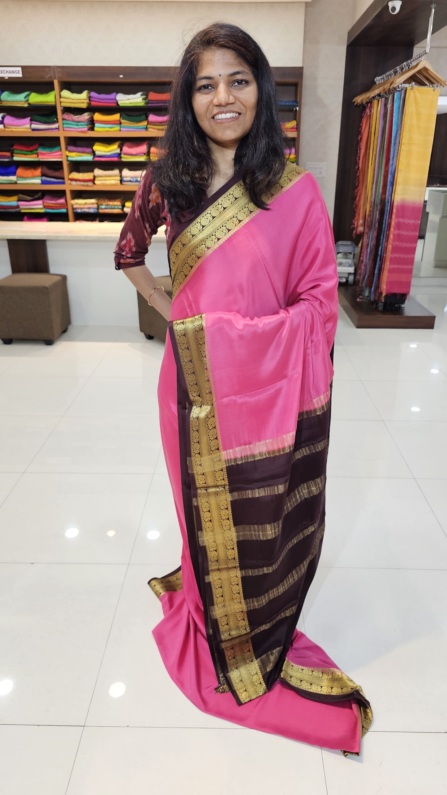 Mysore crepe silk saree with KSIC Finish in peach pink with brown in peacock border