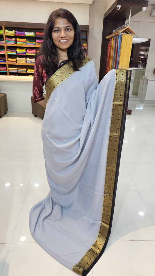 Mysore crepe silk saree with KSIC Finish in mist grey with black in peacock border
