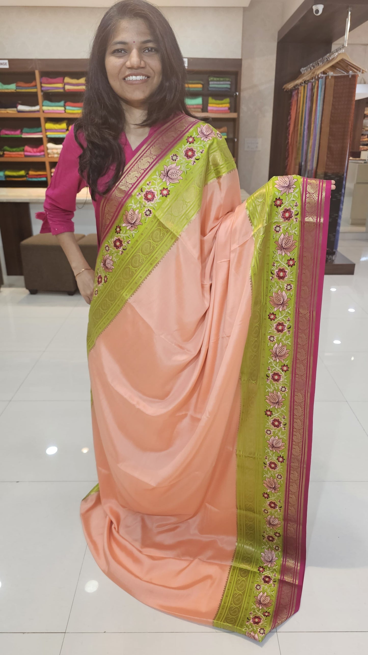 Mysore crepe silk saree with KSIC Finish in peach with green in 3D embroidery pattern