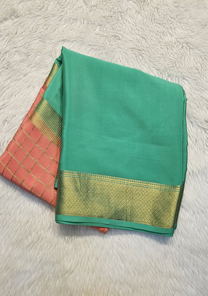 Mysore crepe silk saree with KSIC Finish in rama green with peach pink, in middle checks pattern