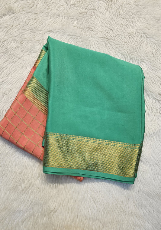 Mysore crepe silk saree with KSIC Finish in rama green with peach pink, in middle checks pattern