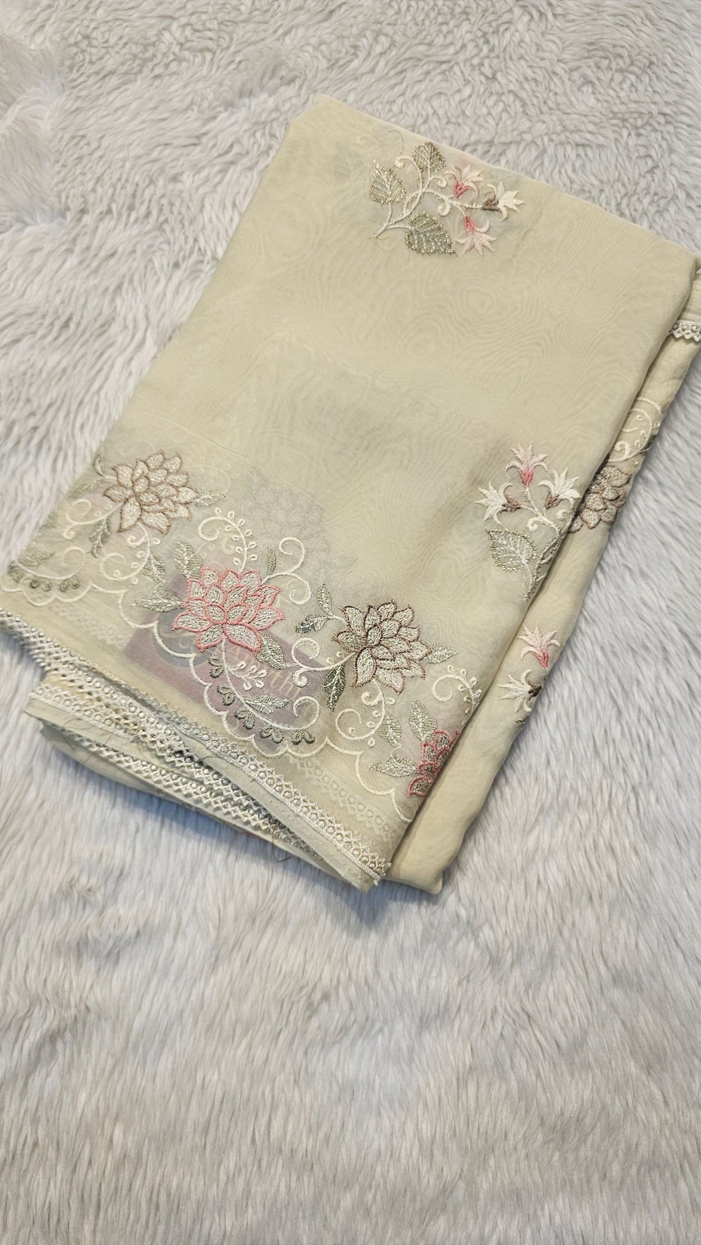 Semi organza fancy saree in light cream self with allover embroidery work