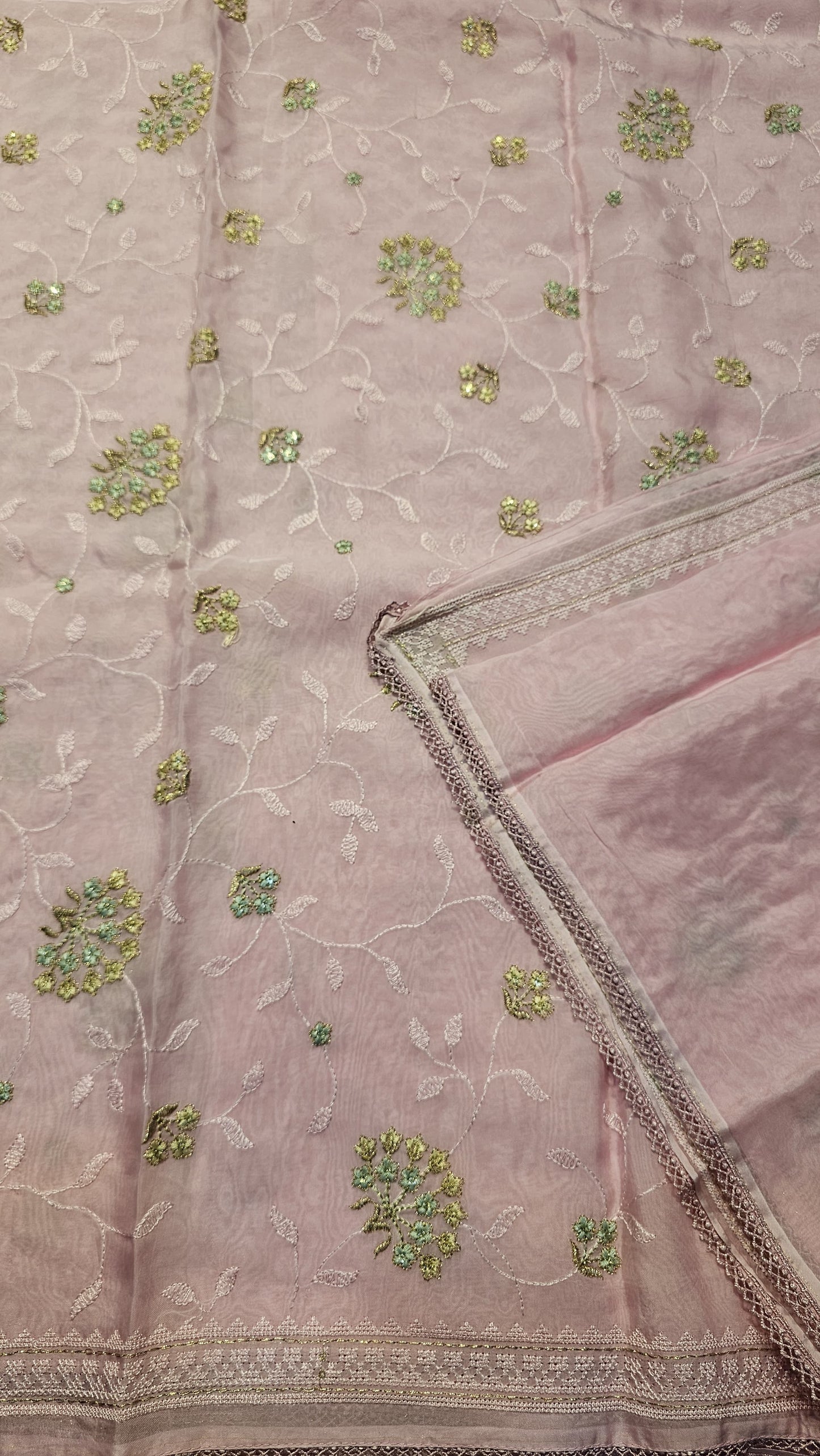 Semi organza fancy saree in candy pink self with allover embroidery work