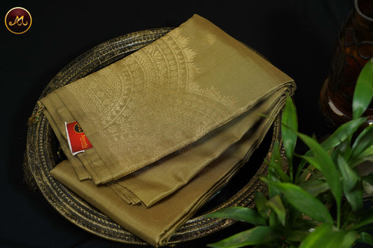 Kanchivaram Soft Silk In All Self in Light Olive green with Motifs and Turning Border
