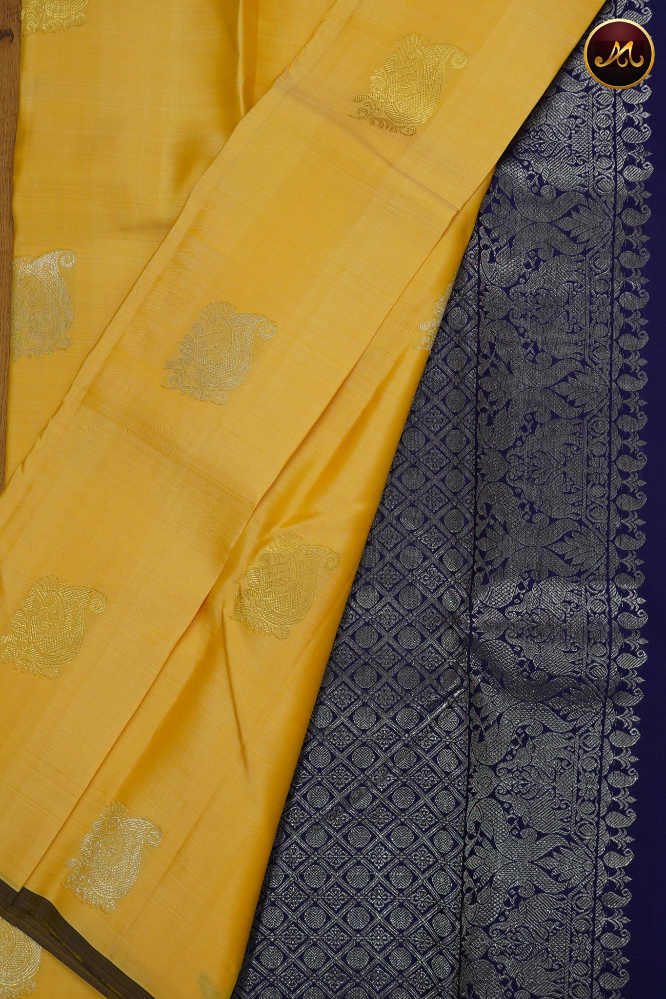 Kanchivaram Silk Saree in Yellow and navy Blue Combination with Silver and Gold Zari Motifs