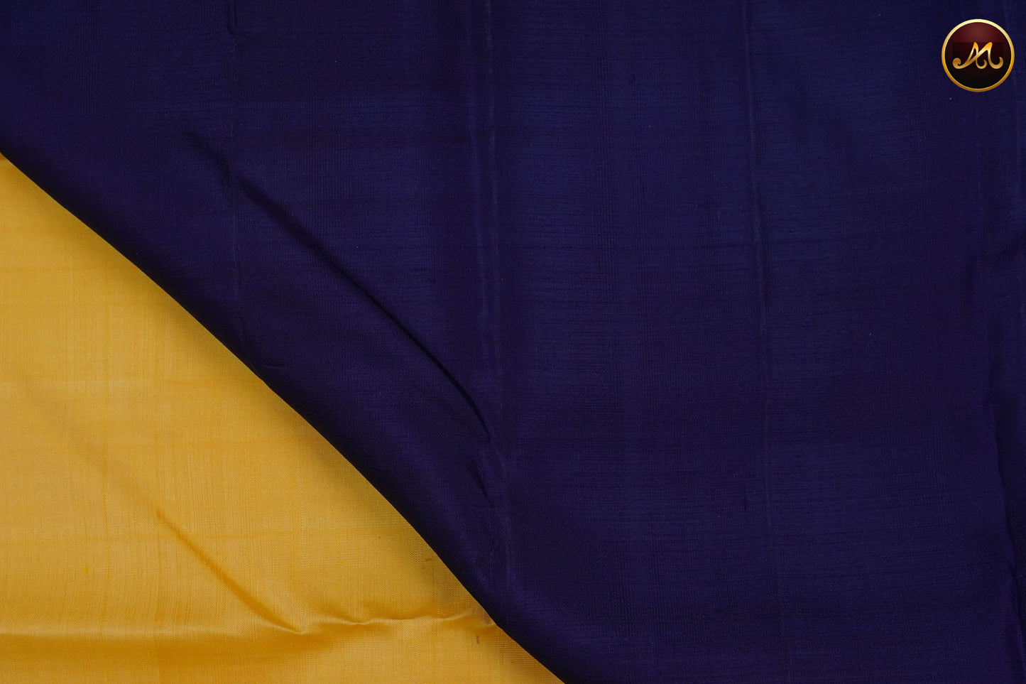 Kanchivaram Silk Saree in Yellow and navy Blue Combination with Silver and Gold Zari Motifs