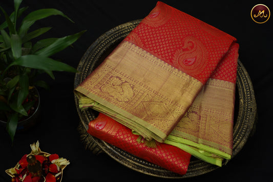 Kanchivaram Pure Silk in Brocade Pattern in Peach And Pista green combination with Golden Long  Border