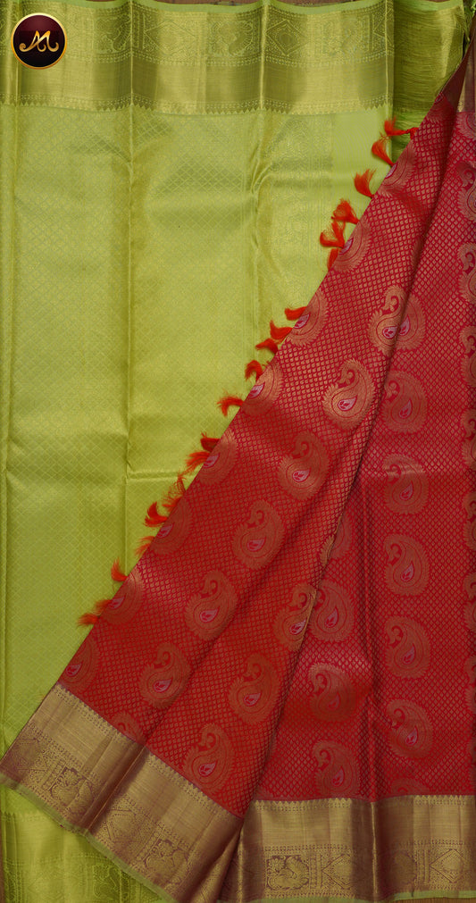 Kanchivaram Pure Silk in Brocade Pattern in Peach And Pista green combination with Golden Long  Border