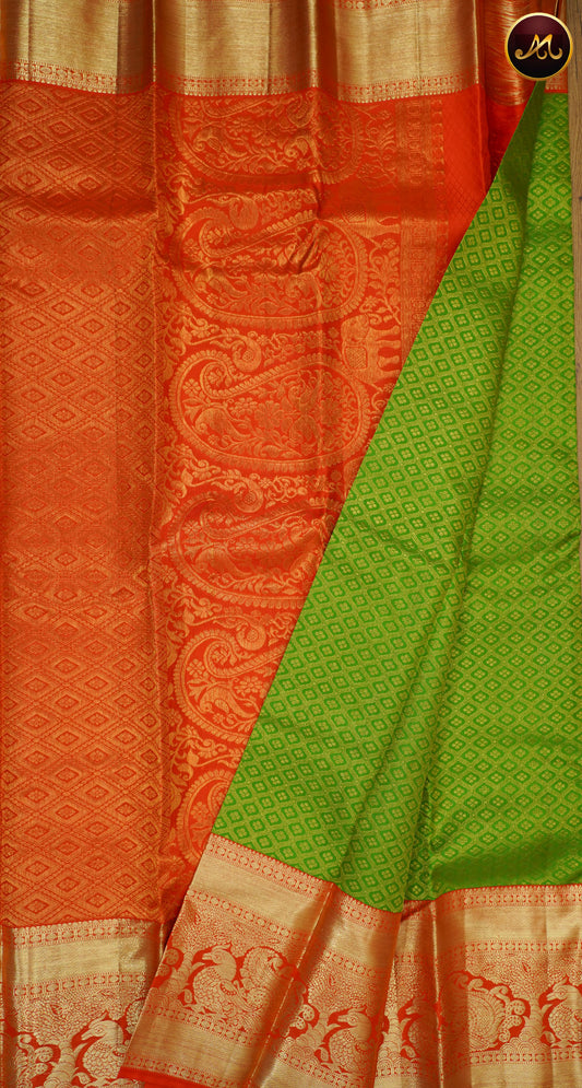 Kanchivaram Pure Silk Saree in parrot green and orange combination with brocade work, long short border in gold zari and rich pallu