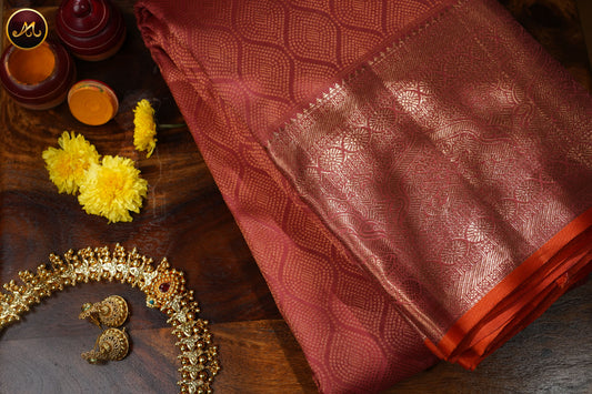 Kanchivaram Pure Silk Saree in light brown combination in self brocade work, gold zari border and rich pallu